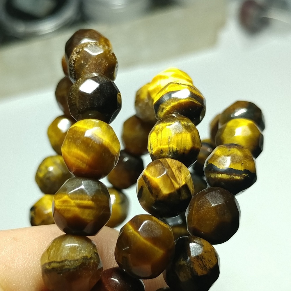 6 mm faceted tiger eye bead steand of 48